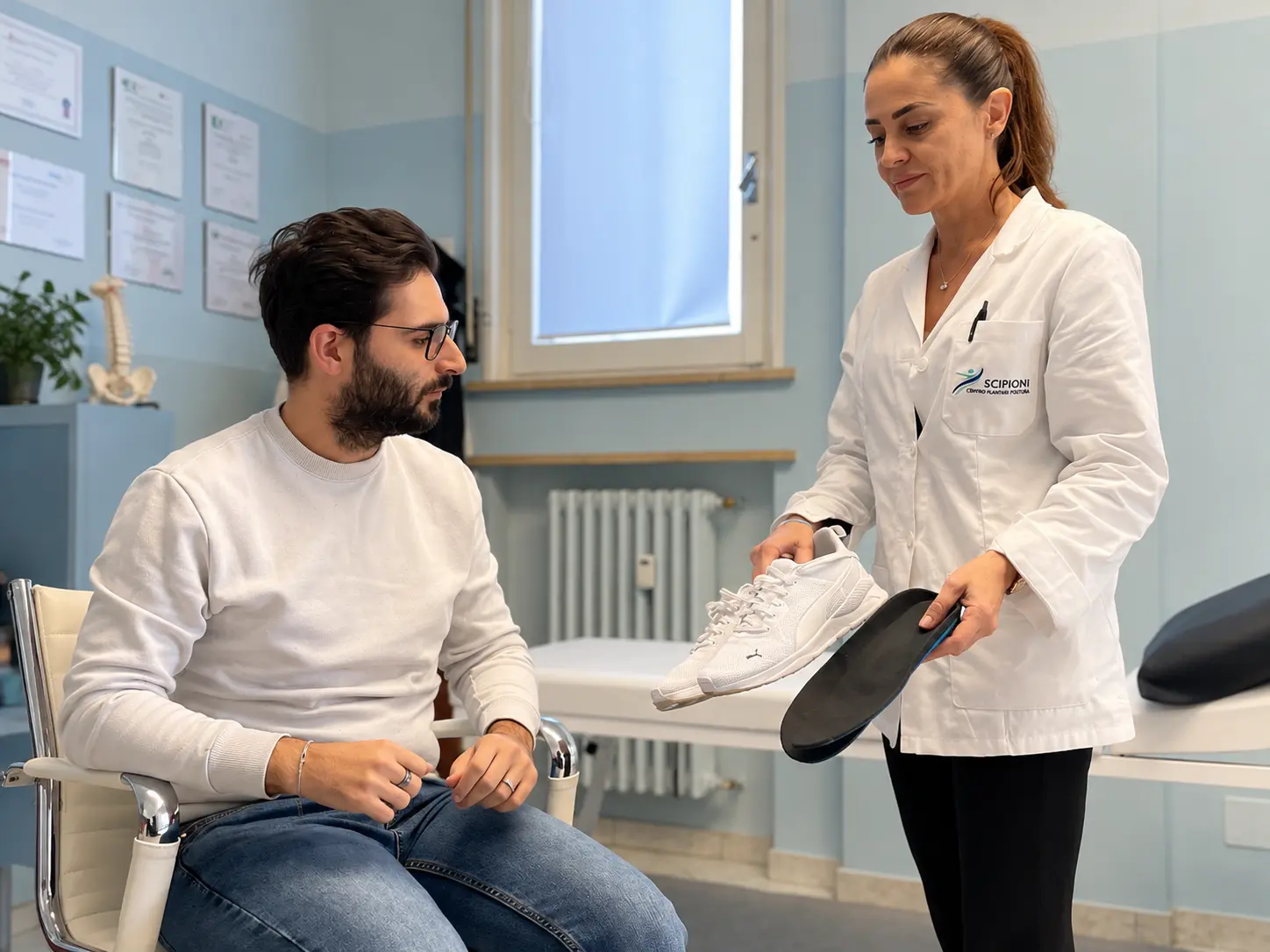 Consultazione podologica con ortesi
